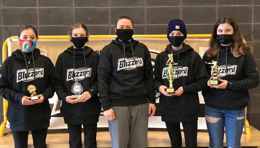 The Cape Breton Blizzard Under-13 ‘AAA’ team annual award winners for the 2020-21 season are from left, Cassie Cremo (most sportsmanlike player), Avery MacNeil (most improved player), Nya Kennedy (coach), Vada Kennedy (coach’s award for leadership) and Ryelyn Gabriel (most dedicated player). CONTRIBUTED • CAPE BRETON BLIZZARD
