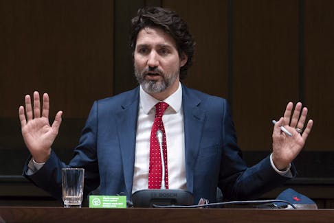 Prime Minister Justin Trudeau responds to a question during a year end interview with The Canadian Press in Ottawa, Wednesday December 16, 2020.