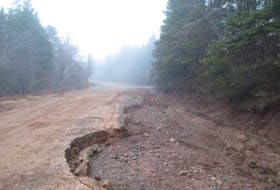 A portion of Foot Cape Road, near Broad Cove Banks Road, eroded away due to the icy conditions from an Easter long weekend storm. IAN NATHANSON/CAPE BRETON POST