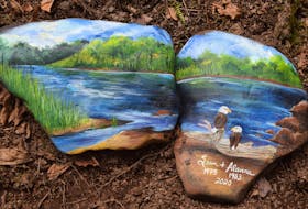 Some of the stones were painted by artists, including these two in memory of Sean McLeod and Alanna Jenkins of West Wentworth, N.S.