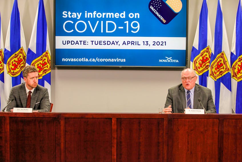 Premier Iain Rankin and Dr. Robert Strang, Nova Scotia’s chief medical officer of health, hold a COVID-19 briefing in Halifax on Tuesday, April 13, 2021. - Communications Nova Scotia