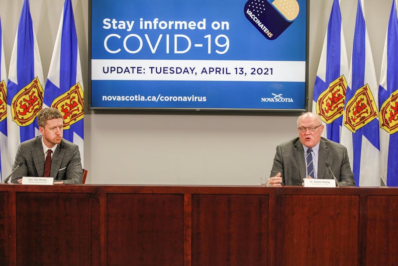Premier Iain Rankin and Dr. Robert Strang, Nova Scotia’s chief medical officer of health, hold a COVID-19 briefing in Halifax on Tuesday, April 13, 2021. - Communications Nova Scotia - Communications Nova Scotia