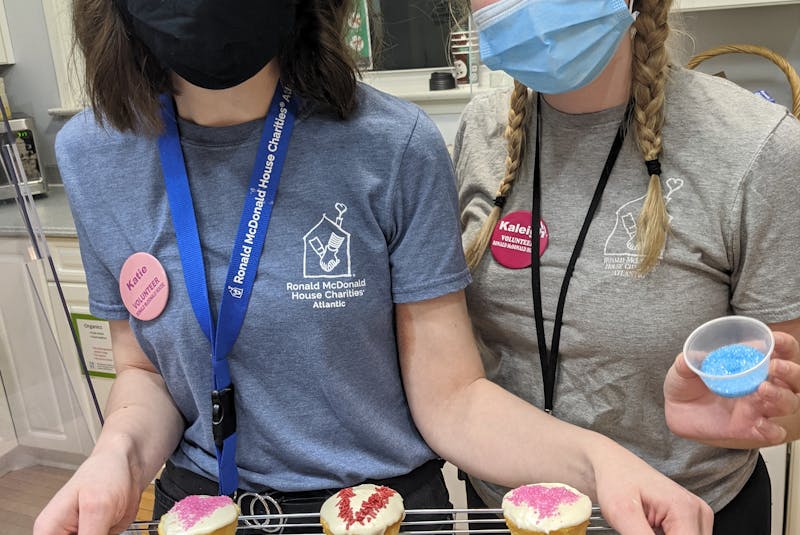 Katie MacLellan, left, and Kaleigh McLeod prepared cupcakes for the clients of Ronald McDonald House Atlantic in February. - Submitted by Ronald McDonald House Atlantic - Saltwire network