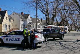 FOR COMMONS STORY:
Halifax regional police are seen at the scene of a pedestrian mva at the intersection of Oxford and Liverpool Streets in Halifax  Thursday April 15, 2021. 

TIM KROCHAK PHOTO