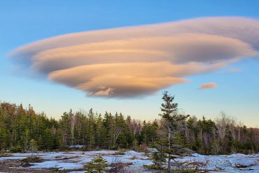 If you were out in the Aspy Bay region of Victoria County, Nova Scotia Friday, April 9th, you couldn't help but notice this unusual cloud formation. Lucky for us, Charlene Lawrence was in Dingwall; she snapped a photo and quickly posted it. Charlene correctly identified it as a Lenticular cloud.
