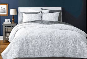White and neutral tones help to create a relaxing place to snooze during the hot summer months. Hometrends Rose White quilt set, $90, Walmart.ca.