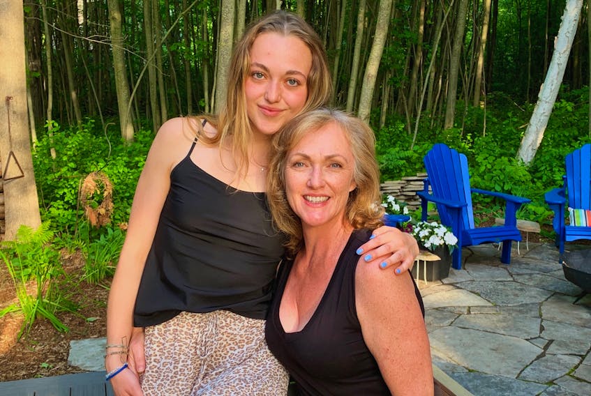 Dalhousie university student Catherine Armour hugs her mother, Margaret, on a trip home to her hometown of Kemptville, Ont. in the spring of 2020.