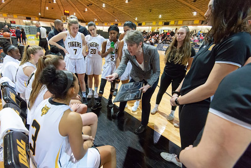 Head coach Anna Pendergast-Stammberger goes over strategy with the Dalhousie Tigers during an Atlantic University Sport women’s basketball contest. Pendergast-Stammberger recently retired following her 12th season as Dalhousie head coach. - Trevor MacMillan Photo/Courtesy of Dalhousie University