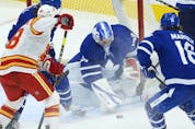 Toronto Maple Leafs David Rittich G (33) tries to smother the puck during the third period in Toronto on Tuesday April 13, 2021. Jack Boland/Toronto Sun/Postmedia Network