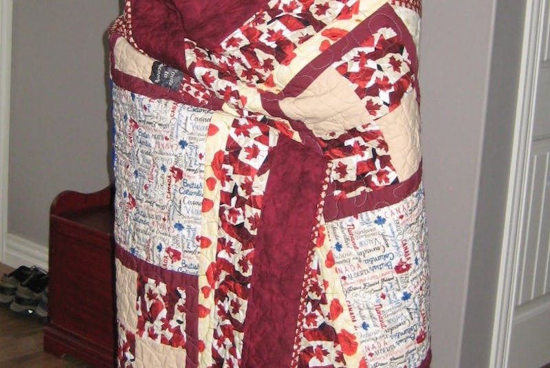 Donald Snook of Come by Chance with his quilt from the Quilts of Valour program. - Contributed