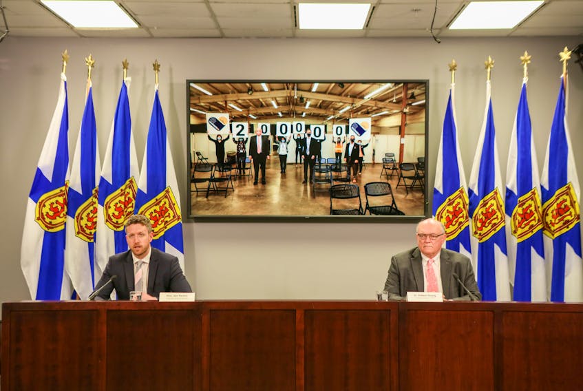 Nova Scotia Premier Iain Rankin and Dr. Robert Strang, chief medical officer of health, hold a COVID-19 news briefing on Friday, April 16, 2021.