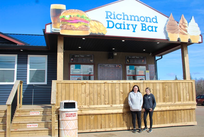 Michelle MacDonald and Cierra Bridges work at Richmond Dairy Bar, where an anonymous man came by and purchased 101 free ice cream cones for kids who came by.