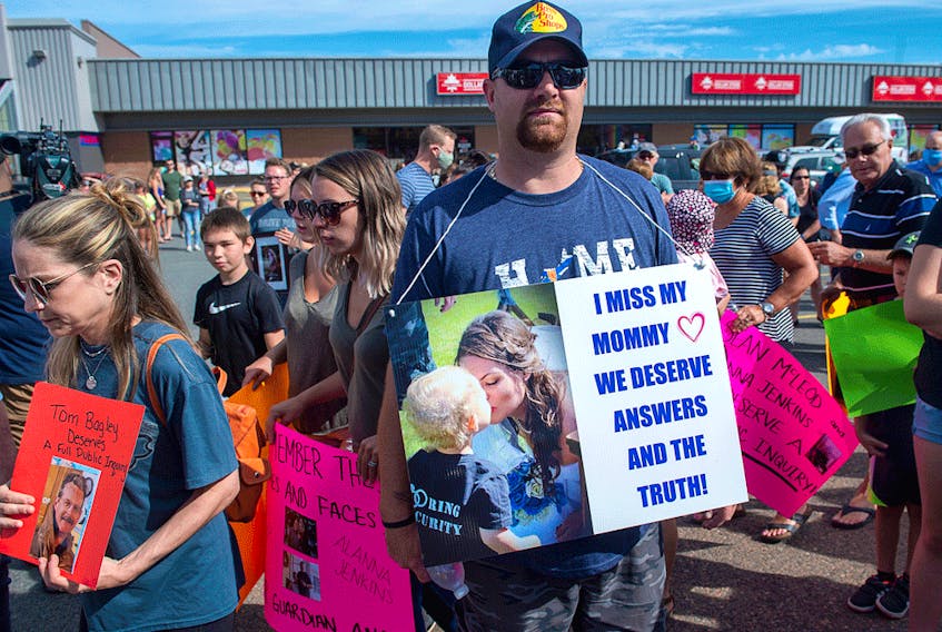 Nick Beaton, whose wife Kristen was killed in the April 2020 mass shooting, attends a march in Bible Hill, N.S. organized by families of victims last summer demanding an inquiry into the crimes that killed 22 people.