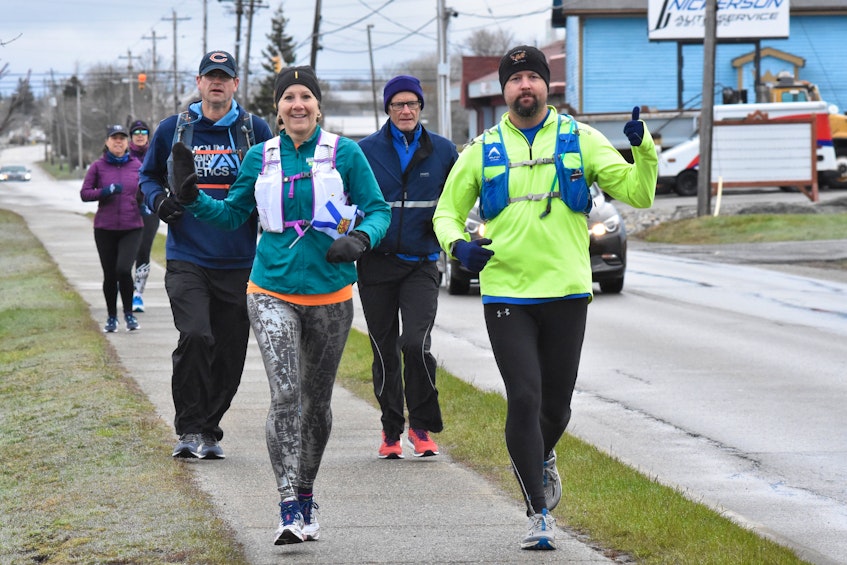 Members of a Yarmouth run club took part in the Nova Scotia Remembers Memorial Run, which saw participation throughout the province on Sunday morning, April 18, to mark the one-year anniversary of the mass shooting tragedy in Portapique a year ago. — Tina Comeau