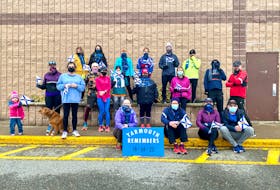 Members of a Yarmouth run club gathered on Sunday morning, April 18, to take part in the Nova Scotia Remembers Memorial Run, which saw participation throughout the province to mark the one-year anniversary of the mass shooting tragedy in Portapique a year ago. TINA COMEAU PHOTO