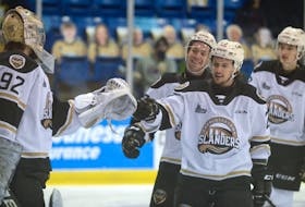 Goalie Colten Ellis, from left, and his Charlottetown Islanders teammates Keiran Gallant, Zac Beauregard and Oscar Plandowski finished the condensed 2020-21 Quebec Major Junior Hockey League in first place overall.