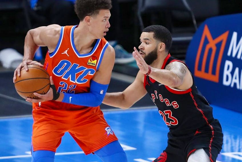 Oklahoma City Thunder centre Isaiah Roby is defended by Toronto Raptors guard Fred VanVleet on a drive during the second half at Chesapeake Energy Arena on March 31, 2021. 

