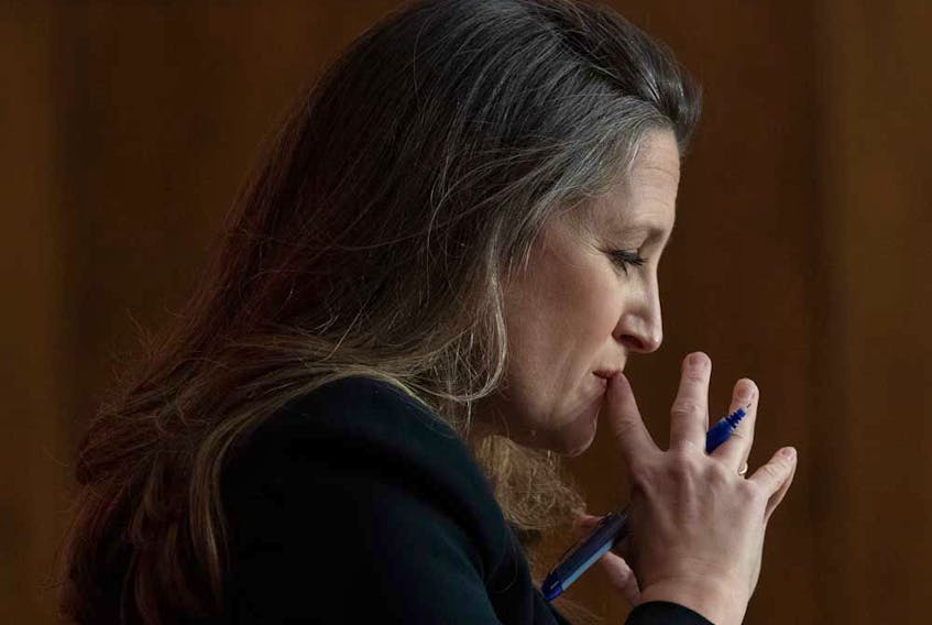 Minister of Finance Chrystia Freeland listens to a question during a news conference on the federal budget on Monday.