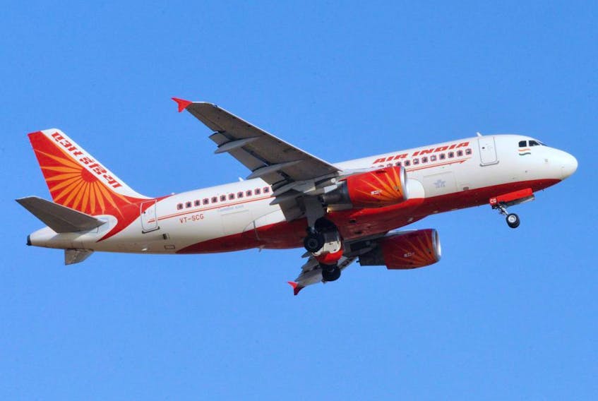 An Air India domestic flight takes off from Sardar Vallabhbhai International Airport in Ahmedabad on May 12, 2012.  