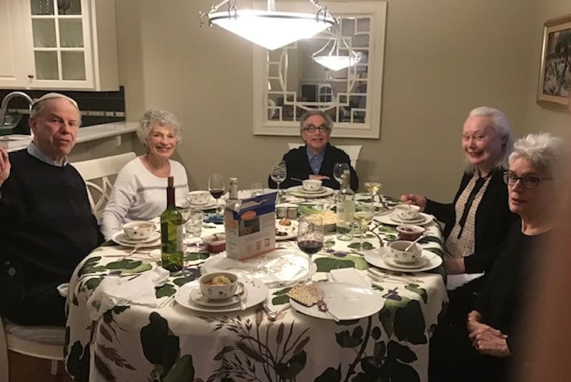 Martin Rutte, left, joins Maida Rogerson, Andrew Melzer, Karin Melzer and Beverly Mednick at a Passover meal.  - Leo Mednick • Special to The Guardian