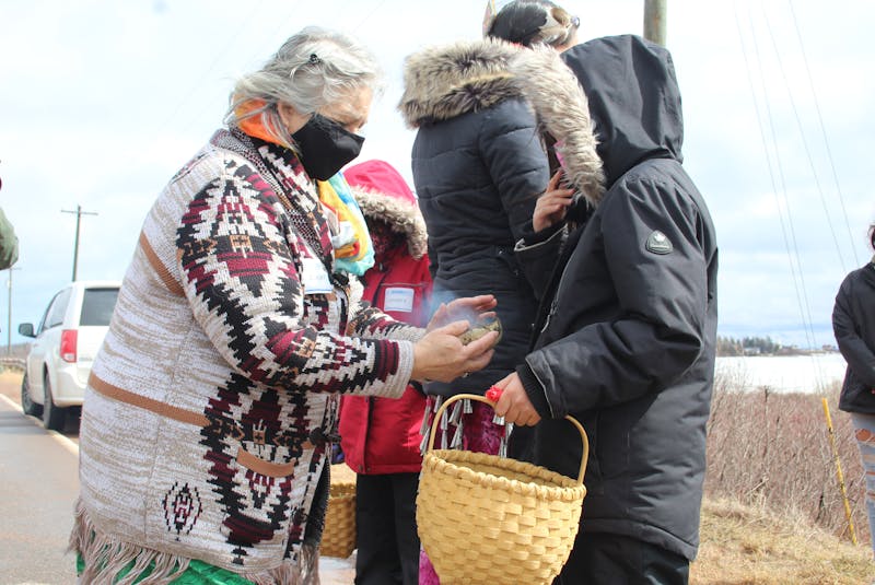 Before the walk began, Mi'kmaq elder Methilda Knockwood-Snache led a smudging ceremony. - Kristin Gardiner