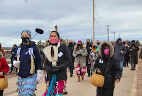 Around 60 to 70 people attended the walk, which started at the top of the causeway and ended at the John J. Sark Memorial School on Lennox Island.