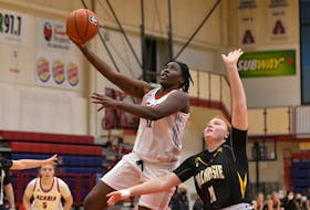Elizabeth-Ann Iseyemi goes for the hoop in an exhibition game against Dalhousie. - Peter Oleskevich