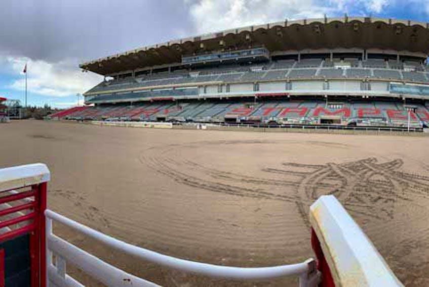  An empty field at the grounds of the Calgary Stampede after it was announced in April 2020 that the event had been cancelled due to the COVID-19 pandemic.