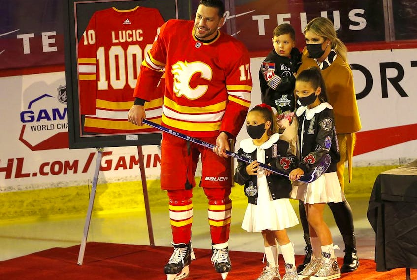  Calgary Flames winger Milan Lucic is honoured for his 1000th NHL game before taking on the Ottawa Senators at the Scotiabank Saddledome in Calgary on Monday, April 19, 2021.