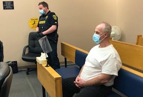 Dennis Peter Murphy sits in Courtroom 6 at provincial court in St. John's Tuesday morning.