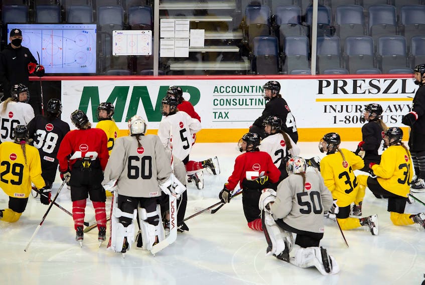 Team Canada players listen to head coach Troy Ryan during practice at the team's selection camp Monday at Scotiabank Centre in Halifax. The IIHF women's world championship, which was scheduled for Halifax and Truro next month, was cancelled on Wednesday. - Hockey Canada Images