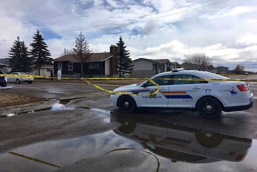 RCMP investigators on the scene of a double homicide in the small town of Chipman, Alberta, east of Edmonton, on April 3, 2017. Raymond Nickerson has been sentenced to five years in prison after Terry Sutton and Jason Williams were shot and killed in a case that began with a dispute over fireworks. Williams was from Prince Edward Island.