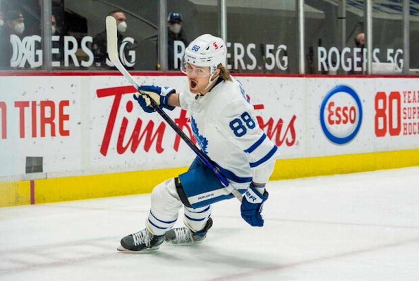 Maple Leafs winger William Nylander celebrates his goal against the Vancouver Canucks on Sunday night. Nylander was in the lineup Tuesday against the Canucks, a day after he was late for a team meeting.