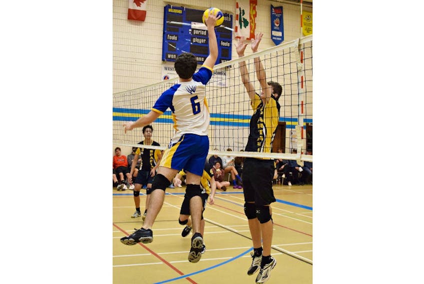 Emmett Gaudette, left, in action with the Westisle Wolverines of the P.E.I. School Athletic Association Senior AAA Boys Volleyball League. Gaudette, who is from Tignish, will join the Holland Hurricanes for the 2021-22 Atlantic Collegiate Athletic Association (ACAA) men’s volleyball season.
