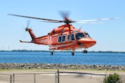 An Ornge helicopter air ambulance takes off from the helicopter pad at the Kingston Health Sciences Centre.