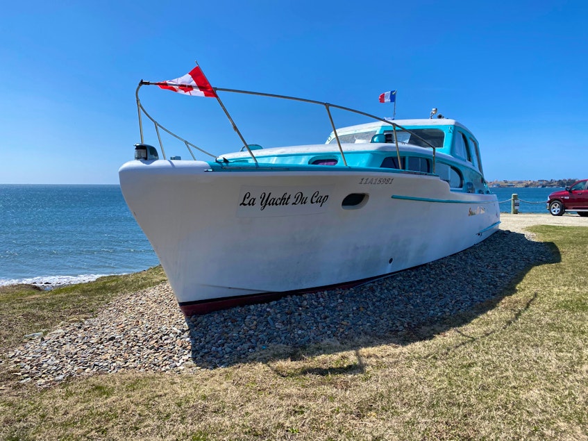 The pretty turquoise-and-white cabin cruiser perched on a grassy site overlooking Mavillette Beach has become a popular takeout in the summer. CARLA ALLEN • TRICOUNTY VANGUARD - Carla Allen