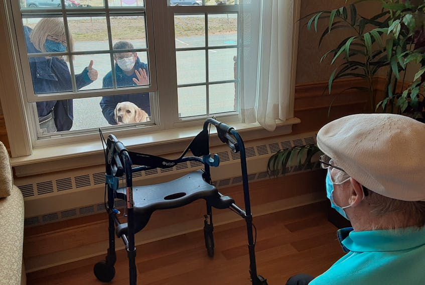 Friends and family marking a momentous occasion in the life of Annapolis Valley long-term care resident Larry Kemp on April 15 had to get creative to ensure Nova Scotia Public Health protocols relating to the global pandemic were followed. – Contributed
