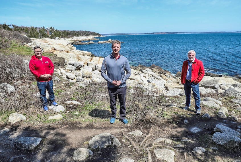 (L-R) Brendan Maguire, MLA for Halifax Atlantic, Premier Iain Rankin, and Minister of Environment and Climate Change Keith Irving explore Herring Cove Provincial Park on Earth Day 2021.