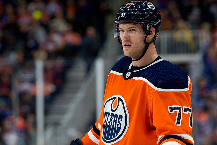 The Edmonton Oilers' Oscar Klefbom (77) faces the Vancouver Canucks at Rogers Place in this file photo from Nov. 30, 2019.