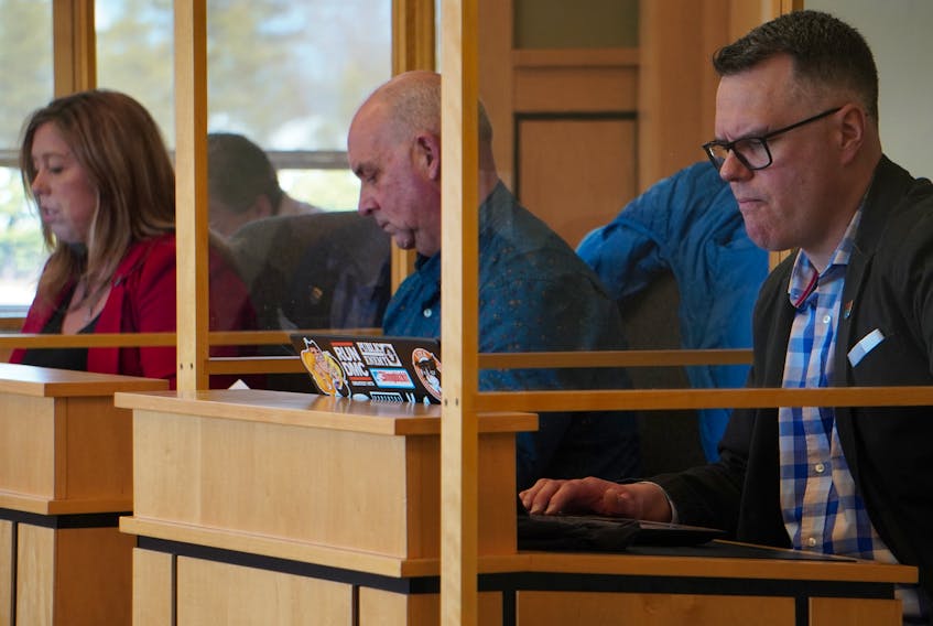 Cornwall councillors Corey Frizzell, right, Shane McGuigan and Elaine Barnes spoke during a council meeting at the town's hall on April 21.