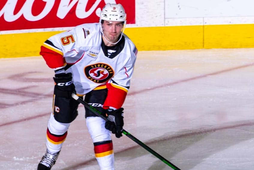 Colton Poolman, now in his first campaign with the Calgary Flames' farm team, is hoping to join his older brother Tucker at the NHL level. (Courtesy of Stockton Heat)