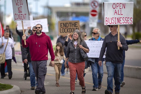  More than 100 people gathered in downtown Windsor on Saturday, April 17, 2021, to protest COVID-19 restrictions.