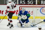  Ottawa Senators forward Tim Stutzle (18) scores on Vancouver Canucks goalie Thatcher Demko (35) in the first period at Rogers Arena.