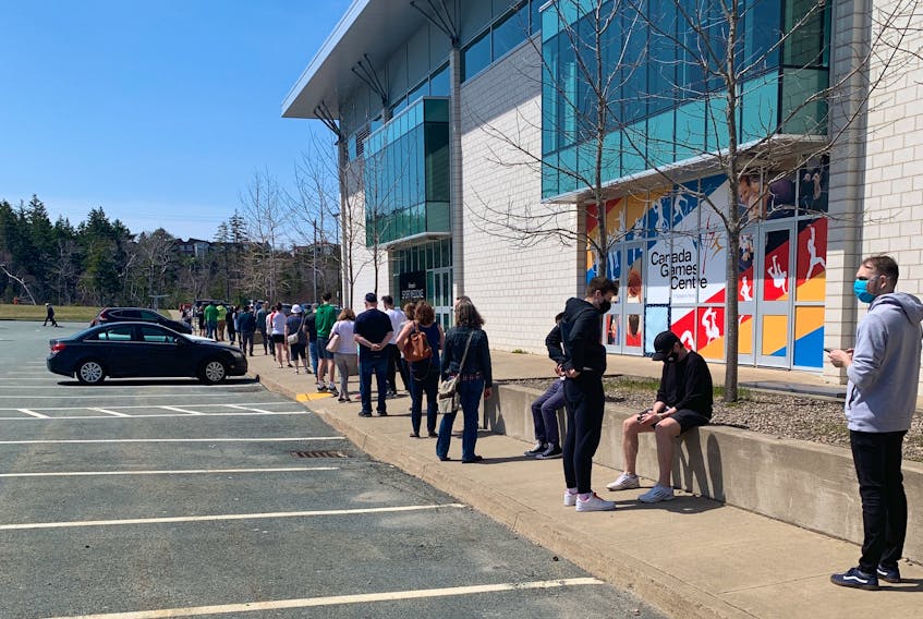 People lined up to get COVID-19 testing at the Canada Games Centre in Clayton Park on Sunday, April 25, 2021. There has been a big response to urging from public health to get tested amid community spread of the virus, including the more aggressive variants.