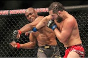 Kamaru Usman (left) fights Jorge Masvidal during the welterweight title bout of UFC 261 at VyStar Veterans Memorial Arena on April 25, 2021, in Jacksonville, Fla.