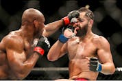  Kamaru Usman lands a punch on Jorge Masvidal during the welterweight title bout of UFC 261 at VyStar Veterans Memorial Arena on April 25, 2021, in Jacksonville, Fla.