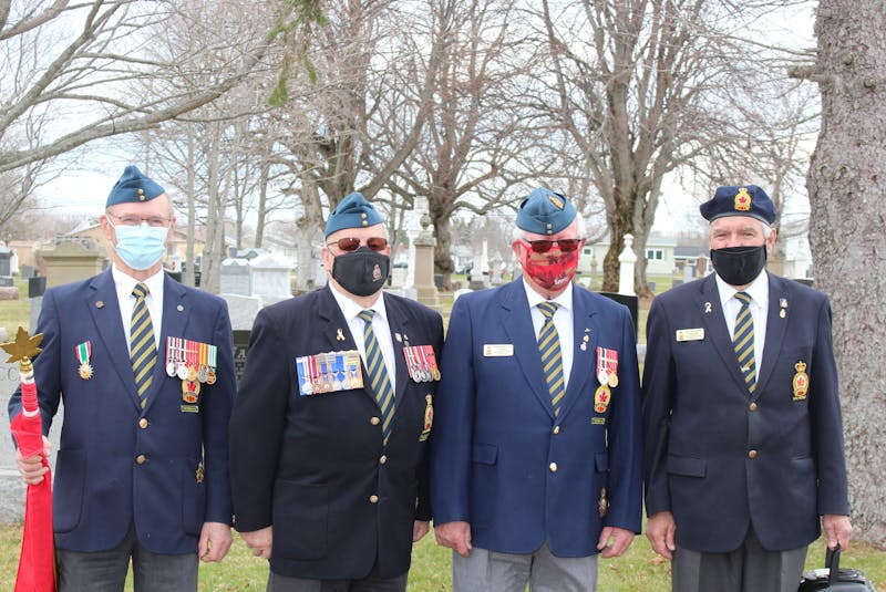 The Royal Canadian Legion Wellington Br. No. 17 members showed their appreciation by doing a moment of silence raising a Canadian flag during the ceremony. From left to right, Gilles Labonte, Gilles Painchaud, Roger Arsenault and Austin Poirier. - Logan Plant