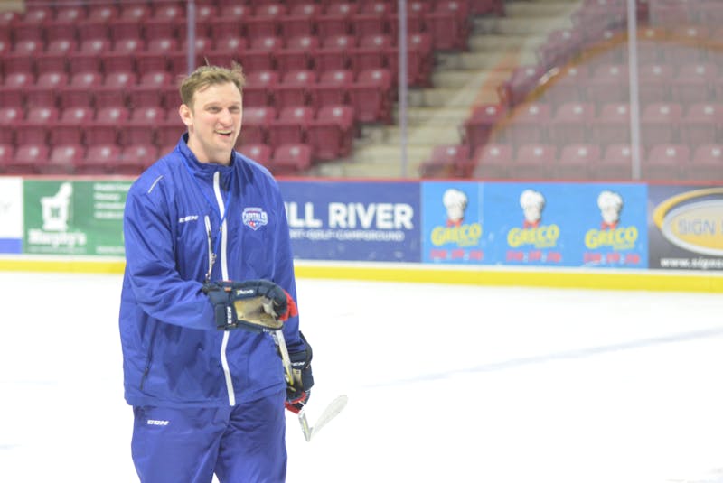 Summerside D. Alex MacDonald Ford Western Capitals assistant coach Jason Gallant is all smiles during a practice at Eastlink Arena earlier this season. Gallant, who will remain with the Caps through their playoff run in the Maritime Junior Hockey League (MHL), has been appointed head coach of the Kensington Monaghan Farms Wild major under-18 program. - Jason Simmonds