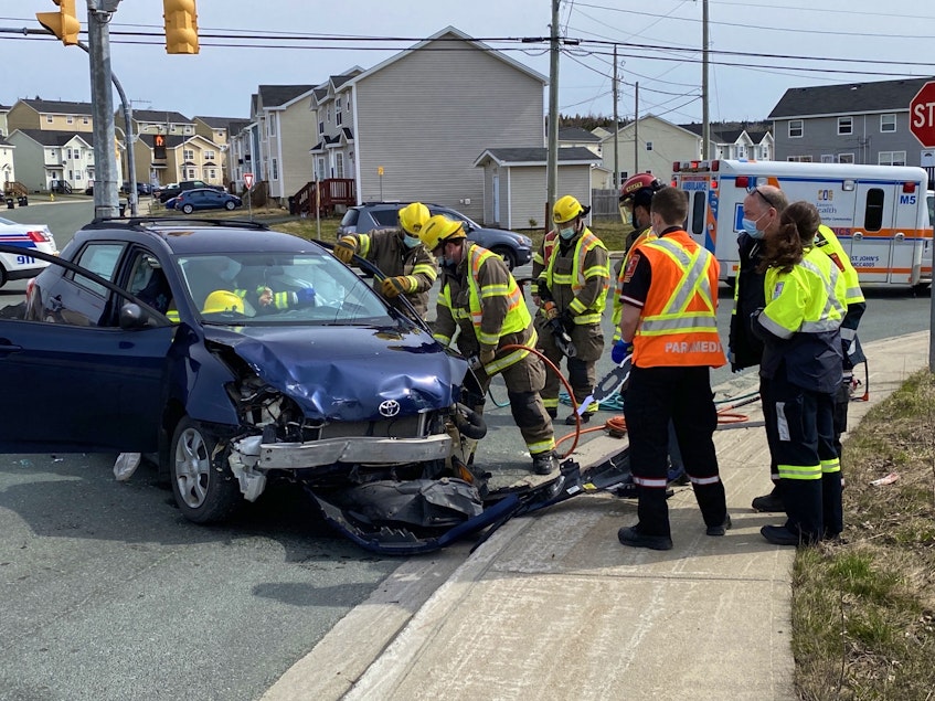 Firefighters had to use hydraulic extrication tools to free the trapped driver of one of the vehicles of a three car crash in St. John's. Keith Gosse/The Telegram