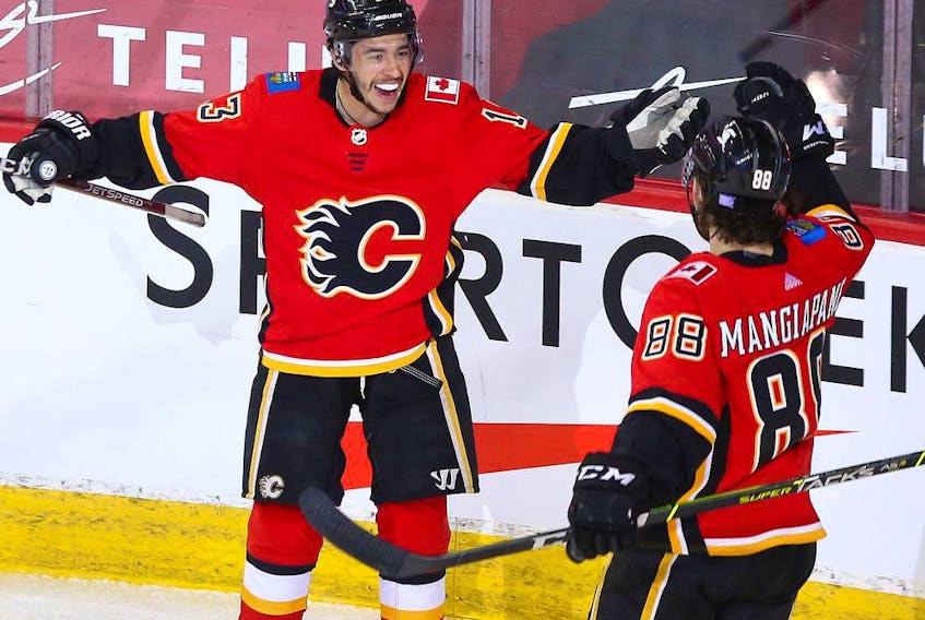  Calgary Flames forward Johnny Gaudreau celebrates a goal against the Montreal Canadiens at the Scotiabank Saddledome in Calgary on Saturday, April 24, 2021.